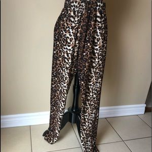 Cozy sexy soft fabric leopard design pants. Dress up with black blazer or top